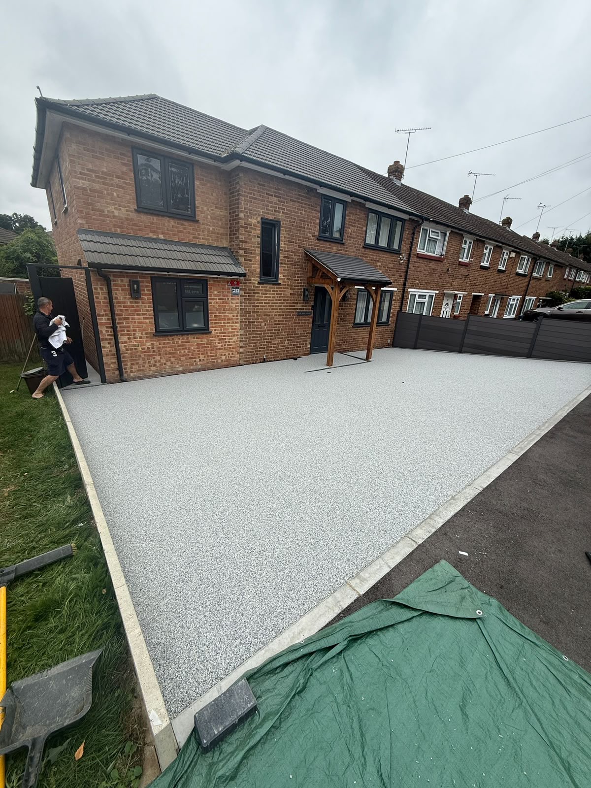 Silver resin bound driveway at a modern brick home